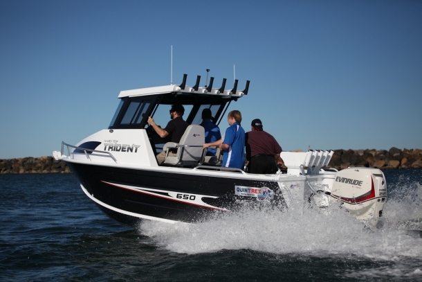 Fisho's Scott Thomas filming Bushy talking about Squidgy's new prawn lures.